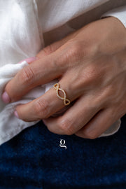 Infinity Twist CZ Ring