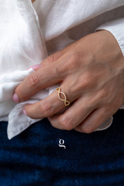 Infinity Twist CZ Ring